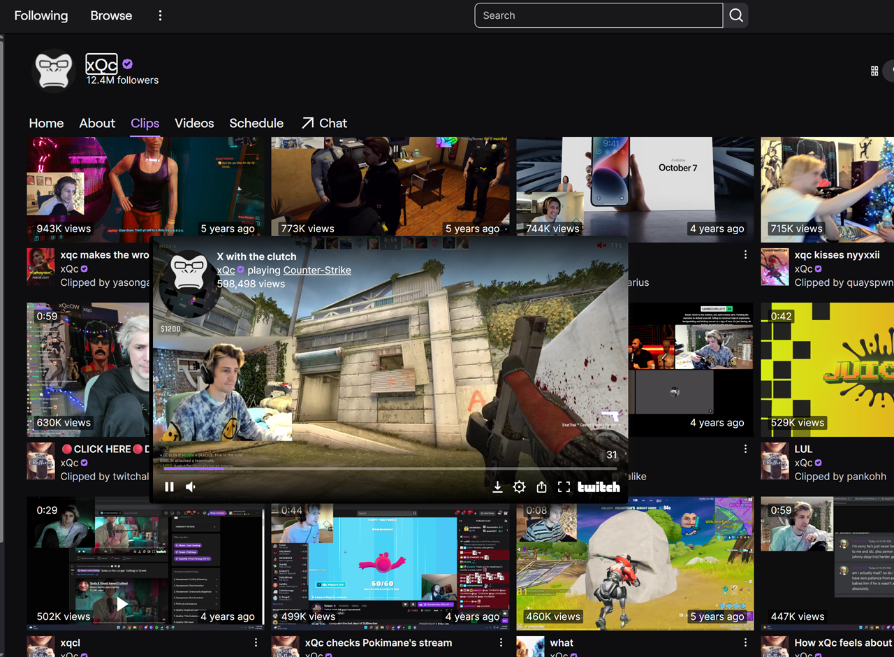 Twitch clips grid with the cursor hovering one thumbnail and an enlarged preview playing the clip in a window next to it